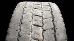 (SECTION 1: Irregular drive tire conditions) 1. Multiple Cuts/Chunking Appearance: Numerous small cuts to the tread surface with portions of tread removed, giving a rough appearance. Probable Cause: Vehicle operation on rough surfaces (misapplication of tread compound). Corrective Action: Review tire selection and operation. Tire Disposition: Minor damage should return to service. Consult retreader for possible repair and retread.