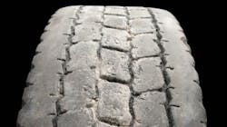 (SECTION 1: Irregular drive tire conditions) 1. Multiple Cuts/Chunking Appearance: Numerous small cuts to the tread surface with portions of tread removed, giving a rough appearance. Probable Cause: Vehicle operation on rough surfaces (misapplication of tread compound). Corrective Action: Review tire selection and operation. Tire Disposition: Minor damage should return to service. Consult retreader for possible repair and retread. (SECTION 1: Irregular drive tire conditions) 1. Multiple Cuts/Chunking Appearance: Numerous small cuts to the tread surface with portions of tread removed, giving a rough appearance. Probable Cause: Vehicle operation on rough surfaces (misapplication of tread compound). Corrective Action: Review tire selection and operation. Tire Disposition: Minor damage should return to service. Consult retreader for possible repair and retread.