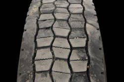 (SECTION 1: Irregular drive tire conditions) 6. Cupping/Scallop/Alternate Lug Wear Appearance: Localized cupped-out areas of fast wear around the tire. Alternate lugs worn to different tread depths around the tire. Probable Cause: Mismatched inflation pressure or tire diameters in a dual assembly. Aggravated by slow rate of wear, poorly maintained suspension components. Corrective Action: Check for mechanical problem. Tire Disposition: Check for worn components, inflation pressures and matching tread depths. (SECTION 1: Irregular drive tire conditions) 6. Cupping/Scallop/Alternate Lug Wear Appearance: Localized cupped-out areas of fast wear around the tire. Alternate lugs worn to different tread depths around the tire. Probable Cause: Mismatched inflation pressure or tire diameters in a dual assembly. Aggravated by slow rate of wear, poorly maintained suspension components. Corrective Action: Check for mechanical problem. Tire Disposition: Check for worn components, inflation pressures and matching tread depths.