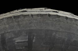 (SECTION 1: Irregular drive tire conditions) 5. Heel/Toe Wear Appearance: Each lug around tire worn high to low from front to back edge. Probable Cause: Mismatched inflation pressure or tire diameters in a dual assembly. High torque conditions, mountainous terrains and high inflation pressures aggravate this condition. Corrective Action: Review tire maintenance practices. Consult tire manufacturer when selecting tire for operation. Tire Disposition: Continue to run. If severe, change direction of rotation. (SECTION 1: Irregular drive tire conditions) 5. Heel/Toe Wear Appearance: Each lug around tire worn high to low from front to back edge. Probable Cause: Mismatched inflation pressure or tire diameters in a dual assembly. High torque conditions, mountainous terrains and high inflation pressures aggravate this condition. Corrective Action: Review tire maintenance practices. Consult tire manufacturer when selecting tire for operation. Tire Disposition: Continue to run. If severe, change direction of rotation.