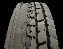 (SECTION 1: Irregular drive tire conditions) 2. Vehicle/Spin Damage Appearance: Cuts or lines 360 degrees around the tire. Probable Cause: Contact with vehicle components (mud flap brackets, bumpers), or spinning the tires on ice or loose road surface. Corrective Action: Analyze cause. Ensure tire does not contact vehicle components. Review driver practices. Tire Disposition: Return to service if damage is not below base of tread groove. (SECTION 1: Irregular drive tire conditions) 2. Vehicle/Spin Damage Appearance: Cuts or lines 360 degrees around the tire. Probable Cause: Contact with vehicle components (mud flap brackets, bumpers), or spinning the tires on ice or loose road surface. Corrective Action: Analyze cause. Ensure tire does not contact vehicle components. Review driver practices. Tire Disposition: Return to service if damage is not below base of tread groove.