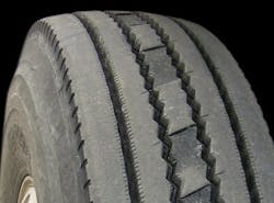 (SECTION 3: Irregular steer tire conditions) 9. Depression Wear (center) Appearance: Circumferential depression wear of the center tread rib. Probable Cause: Overloaded/underinflated, faulty shocks, loose wheel bearings, mismount, high speed empty haul conditions. Corrective Action: Check air pressures/load weight and worn parts. Tire Disposition: Continue to run, rotate or retread. (SECTION 3: Irregular steer tire conditions) 9. Depression Wear (center) Appearance: Circumferential depression wear of the center tread rib. Probable Cause: Overloaded/underinflated, faulty shocks, loose wheel bearings, mismount, high speed empty haul conditions. Corrective Action: Check air pressures/load weight and worn parts. Tire Disposition: Continue to run, rotate or retread.