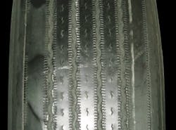 (SECTION 3: Irregular steer tire conditions) 8. Depression Wear (Shoulder) Appearance: Localized wear patch on the shoulder rib of the tire. This patch can repeat around the circumference of the tire. Probable Cause: Faulty shocks, lateral runout, loose wheel bearings, mis-mount, severe balance issue. Corrective Action: Check for mechanical problem. (SECTION 3: Irregular steer tire conditions) 8. Depression Wear (Shoulder) Appearance: Localized wear patch on the shoulder rib of the tire. This patch can repeat around the circumference of the tire. Probable Cause: Faulty shocks, lateral runout, loose wheel bearings, mis-mount, severe balance issue. Corrective Action: Check for mechanical problem.