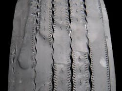 (SECTION 3: Irregular steer tire conditions) 5. Diagonal Wear Appearance: Manifests in the form of oblique wear patches. Can appear singularly or repeat around the circumference of the tire. Probable Cause: Misalignment, radial and lateral runout, severe out of balance, loose wheel bearings or steering parts. Corrective Action: Check for mismount and worn parts. Tire Disposition: Reverse direction of tire or retread. (SECTION 3: Irregular steer tire conditions) 5. Diagonal Wear Appearance: Manifests in the form of oblique wear patches. Can appear singularly or repeat around the circumference of the tire. Probable Cause: Misalignment, radial and lateral runout, severe out of balance, loose wheel bearings or steering parts. Corrective Action: Check for mismount and worn parts. Tire Disposition: Reverse direction of tire or retread.