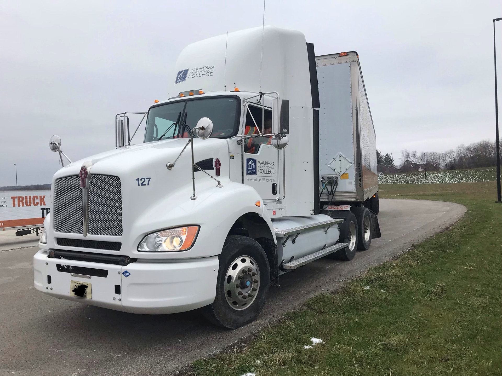 When you're driving a semi truck, it's stressed that you're learning to drive the trailer (versus the tractor). This is because you need to account for all the extra space necessary to navigate the roads when operating a heavy duty commercial vehicle.