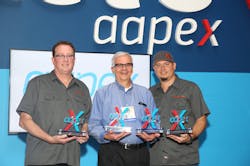 Left to right, representing the Best of Show winners in the AAPEX 2018 Best Booth Awards are Doug Spitler, president, Ullman Devices; Flloyd Sobczak, marketing manager, Gates Corporation; and Mike Barthel, marketing manager, Ullman Devices. Left to right, representing the Best of Show winners in the AAPEX 2018 Best Booth Awards are Doug Spitler, president, Ullman Devices; Flloyd Sobczak, marketing manager, Gates Corporation; and Mike Barthel, marketing manager, Ullman Devices.