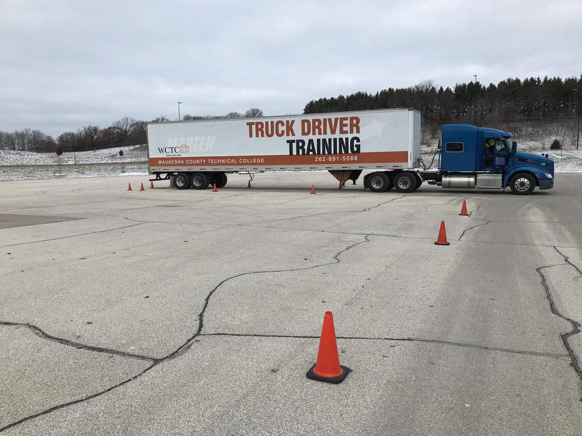 There are three sections of testing to earn a commercial driver's license: the pre-trip inspection, backing, and a road demonstration.