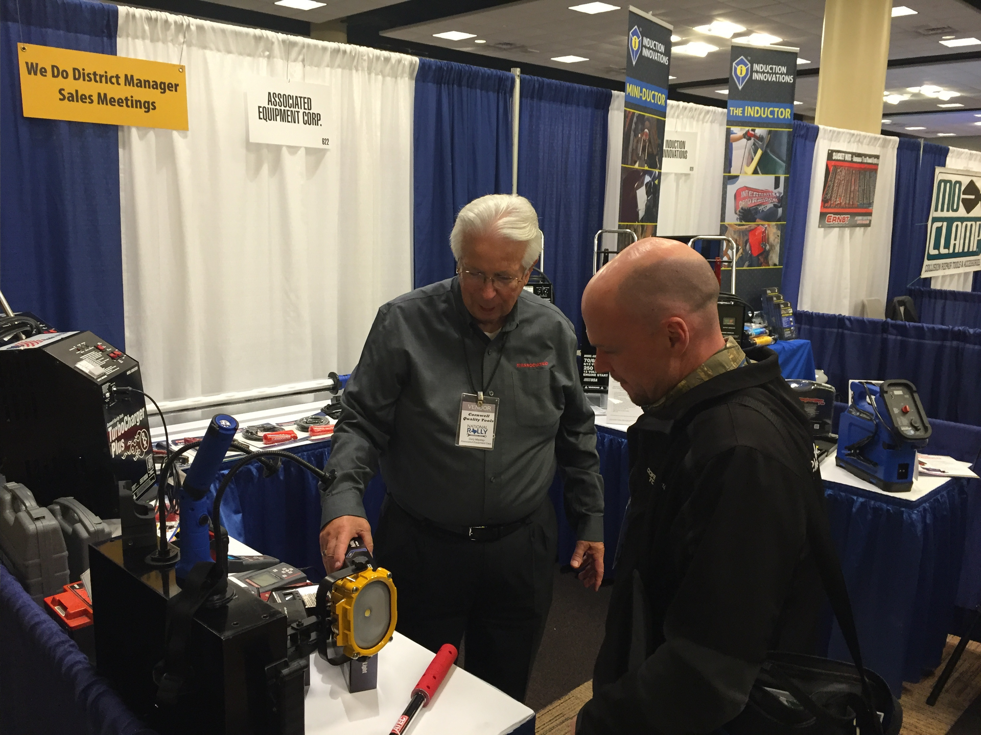 Gary Mackey of Associated Equipment demonstrates one of the company's products at a Cornwell Quality Tools rally.