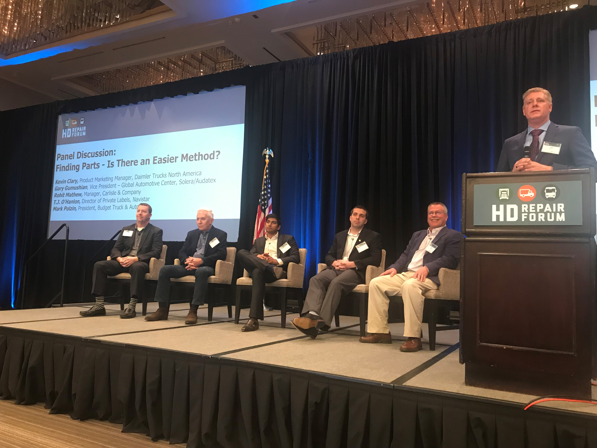 The HD Repair Forum of panelists discussed challenges with parts for the heavy duty collision repair industry. The panel featured industry representatives providing perspective from truck manufacturers, insurance claims and service estimators, and vehicle body and collision repairers, including (from left to right): Kevin Clary, Daimler Trucks North America; Gary Gumushian, Solera - Audatex; Rohit Mathew, Carlisle & Company; T.J. O'Hanlon, Navistar; and Mark Polzin, Budget Truck & Auto.