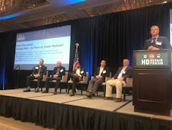 The HD Repair Forum of panelists discussed challenges with parts for the heavy duty collision repair industry. The panel featured industry representatives providing perspective from truck manufacturers, insurance claims and service estimators, and vehicle body and collision repairers, including (from left to right): Kevin Clary, Daimler Trucks North America; Gary Gumushian, Solera - Audatex; Rohit Mathew, Carlisle & Company; T.J. O'Hanlon, Navistar; and Mark Polzin, Budget Truck & Auto. The HD Repair Forum of panelists discussed challenges with parts for the heavy duty collision repair industry. The panel featured industry representatives providing perspective from truck manufacturers, insurance claims and service estimators, and vehicle body and collision repairers, including (from left to right): Kevin Clary, Daimler Trucks North America; Gary Gumushian, Solera - Audatex; Rohit Mathew, Carlisle & Company; T.J. O'Hanlon, Navistar; and Mark Polzin, Budget Truck & Auto.