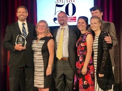 LSI President and Founder Chris Gabrelcik accepts the Smart 50 Award for Innovation, sponsored by Smart Business Magazine, with members of his family. LSI President and Founder Chris Gabrelcik accepts the Smart 50 Award for Innovation, sponsored by Smart Business Magazine, with members of his family.