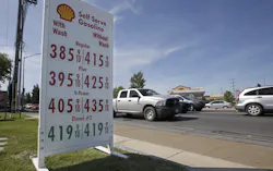 This April 23 file photo shows gas prices displayed at a Shell station in Sacramento, California. Four major automakers have reached a secret deal with California to increase gas mileage and greenhouse gas emissions standards, bypassing the Trump administration’s plan to freeze standards at 2021 levels, according to two people briefed on the matter.