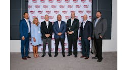 Wabco team members accept the 2019 Pinnacle Award from Wabash National senior leaders. Pictured are (left to right) Richard Mansilla, director of global strategic sourcing, Wabash National; Allison Belden, customer service manager, Wabco; Patrick Kealy, trailer business leader, Wabco North America; Brent Yeagy, president and CEO, Wabash National; Zakary Kennedy, key account leader, Wabco; Nick Adler, vice president of supply chain and business transformation, Wabash National; and Cody Vaught, global category manager, Wabash National.