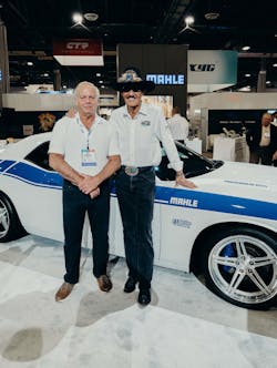 Grand Prize winner Jim Pickles and 'The King' Richard Petty aside Pickles' supercharged Dodge Challenger at MAHLE's booth at AAPEX. Grand Prize winner Jim Pickles and 'The King' Richard Petty aside Pickles' supercharged Dodge Challenger at MAHLE's booth at AAPEX.