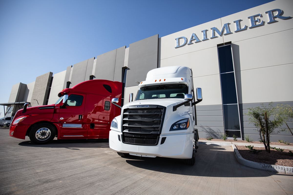 Freightliner Cascadias outside the Goodyear, Arizona DTNA parts distribution center.