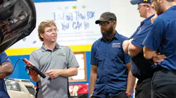 Alfred State College of Technology Instructor Jason Kellogg works with students in a recently rebranded ‘Race to 2026’ technical training facility at the school.