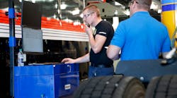 Penske technician and 2019 Tech Showdown finalist Ryan Sutherland works through the troubleshooting process during the hands-on exhaust stream management skill test.