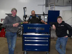 Eric Henricks (center) and the next generation of Henricks' Auto Service, Cameron (left) and Connor (right). Eric Henricks (center) and the next generation of Henricks' Auto Service, Cameron (left) and Connor (right).