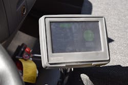 A close-up of the Human-Machine interface display that is mounted inside of the cab. A close-up of the Human-Machine interface display that is mounted inside of the cab.