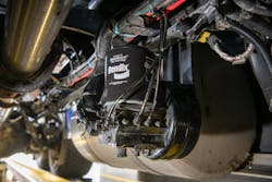 Pictured is a Bendix AD-IS dryer with PuraGuard oil-coalescing filter mounted on a truck. Oil-coalescing filters are essential for trucks with AMTs due to an AMTs’ need for extremely high-quality air. Pictured is a Bendix AD-IS dryer with PuraGuard oil-coalescing filter mounted on a truck. Oil-coalescing filters are essential for trucks with AMTs due to an AMTs’ need for extremely high-quality air.