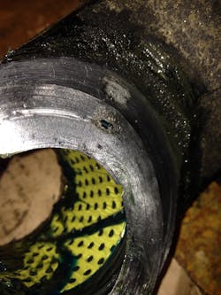 Pictured is a worn shim, part of the kingpin kit. Dana Aftermarket suggests replacing all parts of the kingpin kit, including shims, when servicing. Pictured is a worn shim, part of the kingpin kit. Dana Aftermarket suggests replacing all parts of the kingpin kit, including shims, when servicing.