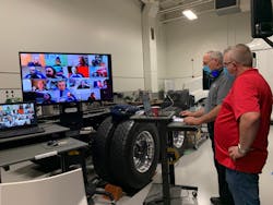 DTNA Technician Skills Competition judges collaborating online with participants. DTNA Technician Skills Competition judges collaborating online with participants.