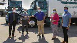 General Manager of Volvo Trucks North America’s TEC Equipment dealership, Mike Reardon, hands over the keys to the first Volvo VNR Electric Class 8 truck models to Joe Finney with Dependable Highway Express. From left to right: Joe Finney, chief operating officer, Dependable Highway Express; Troy Musgrave, director of process improvement, Dependable Highway Express; Mike Reardon, general manager, TEC Equipment; Janice Rutherford, County Supervisor, San Bernardino County and South Coast Air Quality Management District board member; Aravind Kailas, advanced technology policy director, Volvo Group North America.