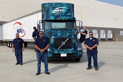 The Volvo VNR Electric trucks will be based at an NFI facility in Southern California that serves as a central distribution center for the region. From left to right: Robert Estrella (driver), Chibuike Nwadigo (driver), Hector Banuelos (fleet manager), Jeffrey Howard (driver), and Elvis Alvarado (driver). The Volvo VNR Electric trucks will be based at an NFI facility in Southern California that serves as a central distribution center for the region. From left to right: Robert Estrella (driver), Chibuike Nwadigo (driver), Hector Banuelos (fleet manager), Jeffrey Howard (driver), and Elvis Alvarado (driver).