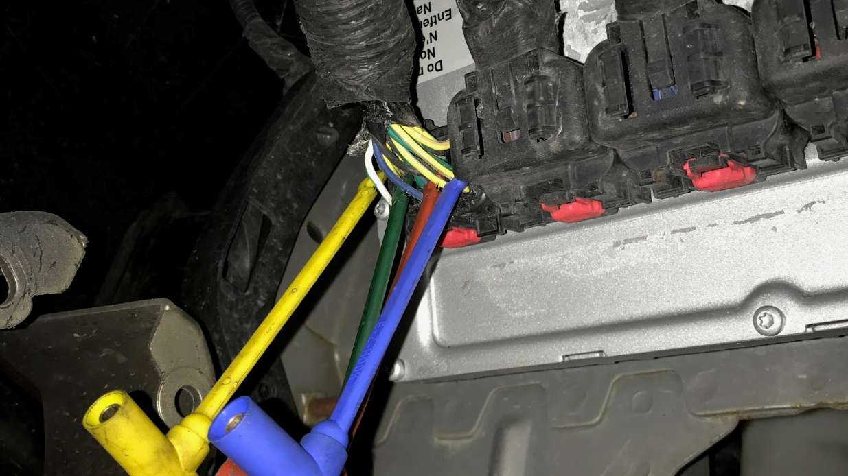 Fig. 3 - The PCM was located within the left-front fender well of the vehicle (shown here).