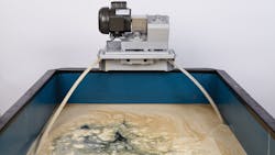 The Model 5H Brill tube-type oil skimmer mounts directly on the edge of the main wastewater holding tank. The free-floating collector tube actively and continuously removes the oil and grease as it rises to the surface of the water. The Model 5H Brill tube-type oil skimmer mounts directly on the edge of the main wastewater holding tank. The free-floating collector tube actively and continuously removes the oil and grease as it rises to the surface of the water.