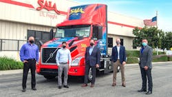 Saia representatives pictured from left to right: Kevin Szydel, vice president of operations, west; Patrick Sugar, executive vice president of operations; Fritz Holzgrefe, president and chief executive officer; Cris Burgum, vice president of maintenance and properties; and Brandon Bruton, director of maintenance and administration. Saia representatives pictured from left to right: Kevin Szydel, vice president of operations, west; Patrick Sugar, executive vice president of operations; Fritz Holzgrefe, president and chief executive officer; Cris Burgum, vice president of maintenance and properties; and Brandon Bruton, director of maintenance and administration.