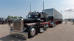 Best of Show winners Kiegen Nelson and Vinnie Diorio of Richfield, Wisconsin, show off the 2020 Peterbilt 389 at Shell Rotella's 2021 SuperRigs event. Best of Show winners Kiegen Nelson and Vinnie Diorio of Richfield, Wisconsin, show off the 2020 Peterbilt 389 at Shell Rotella's 2021 SuperRigs event.