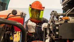 A Milea Truck Sales and Leasing technician services a Volvo VNR Electric. A Milea Truck Sales and Leasing technician services a Volvo VNR Electric.