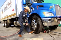 Julio Moraga Of Commercial Tire Bolts On A Yokohama 104 Zr Spec 2 Tire Julio Moraga Of Commercial Tire Bolts On A Yokohama 104 Zr Spec 2 Tire