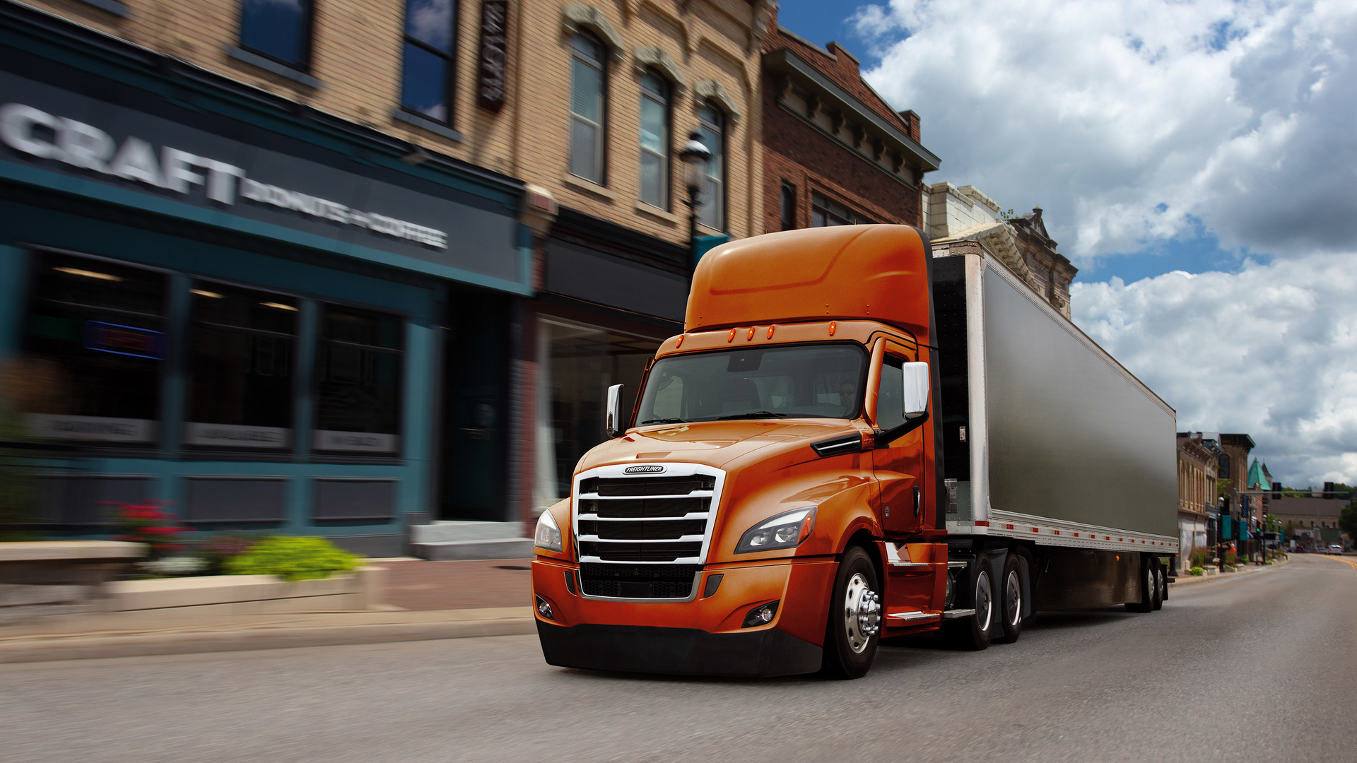 Freightliner Cascadia Orange 6151c0e5ea49e