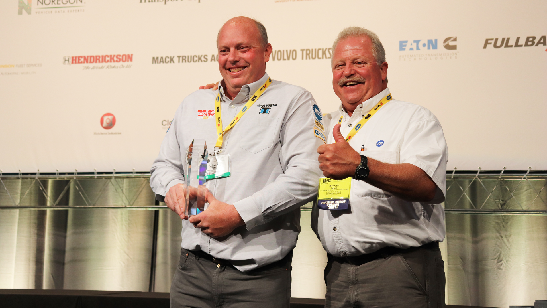 Chris Tate of Mohawk Trucks celebrates his second TMC SuperTech first place finish with fellow two-time grand champion Bryan Lewis at TMC 21 in Cleveland. Tate competed in 16 SuperTech competitions and plans to become a judge in the competition next year.