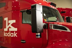 Kodiak’s modular sensor suites are on three locations on the truck: a “center pod” on the front roofline and pods integrated into both of the side mirrors. Kodiak’s modular sensor suites are on three locations on the truck: a “center pod” on the front roofline and pods integrated into both of the side mirrors.