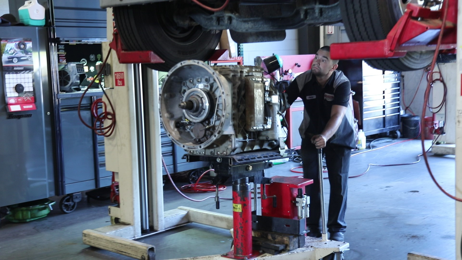 TranSource uses full truck lifts in their facilities to assist in AMT services and inspection.