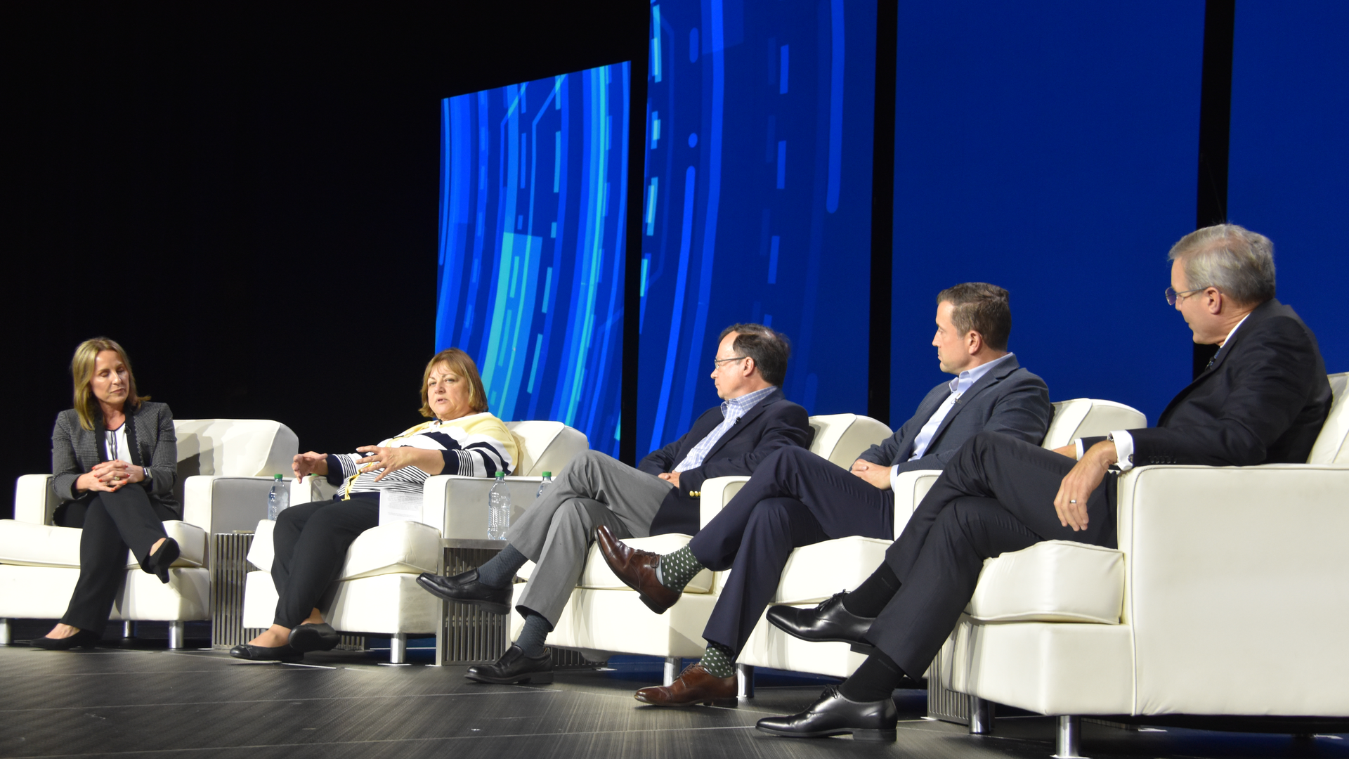 Discussing supply chain challenges during a luncheon session at the ATA convention are, from left, moderator Shelley Simpson, J.B. Hunt; Gail Rutkowski, NASSTRAC; John Butler, World Shipping Council; Ian Jefferies, Association of American Railroads; and Chis Spear, ATA.