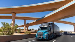 A Torc Robotics-powered Freightliner Cascadia drives through Albuquerque, New Mexico. A Torc Robotics-powered Freightliner Cascadia drives through Albuquerque, New Mexico.