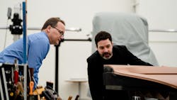 Darek Villeneuve (left) and Jeff Cotner (right) observe the sleek design of the SuperTruck II. Darek Villeneuve (left) and Jeff Cotner (right) observe the sleek design of the SuperTruck II.