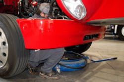 Technicians at Rush Truck Leasing - Las Vegas utilize an assortment of spill containment equipment. Technicians at Rush Truck Leasing - Las Vegas utilize an assortment of spill containment equipment.