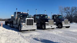 From left, a Peterbilt 389, equipped with the TX-12 transmission and 80,000 lb., a Peterbilt 579, equipped with the TX-18 transmission and 80,000 lb., and a Peterbilt 567, equipped with the TX-18 Pro and 140,000 lb., are lined up and ready to take on the Eaton proving grounds test track. From left, a Peterbilt 389, equipped with the TX-12 transmission and 80,000 lb., a Peterbilt 579, equipped with the TX-18 transmission and 80,000 lb., and a Peterbilt 567, equipped with the TX-18 Pro and 140,000 lb., are lined up and ready to take on the Eaton proving grounds test track.