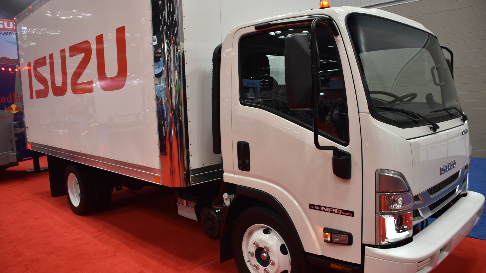 A 2023 Isuzu N-Series on the show floor at the Indianapolis Convention Center during Work Truck Week 2020.