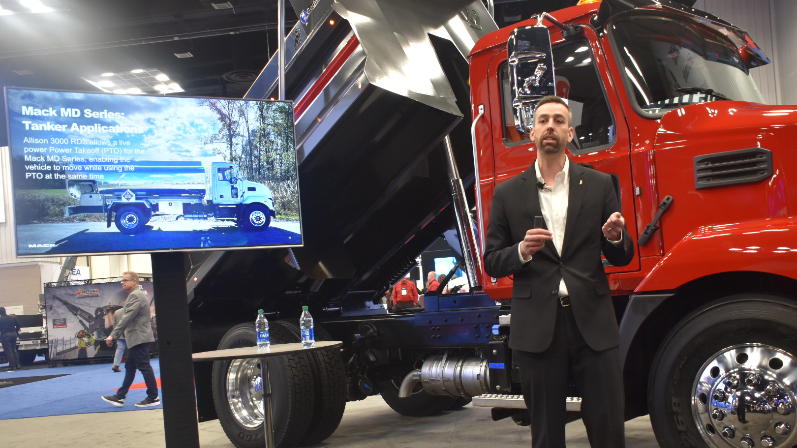 Tim Wrinkle, Mack&rsquo;s construction product manager, helps introduce the Allison upgrade at the OEM's exhibit space at Work Truck Week 2022 on March 9.