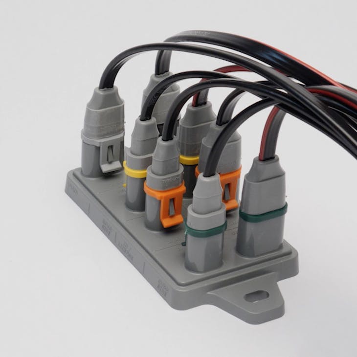 Peterson PATRIOT Modular Harness Systems&rsquo; distribution module connects all lighting components to a small footprint central hub.