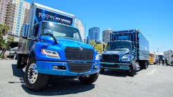 International’s eMV, left, and Freightliner’s eM2, battery-electric medium-duty trucks on display at ACT Expo 2022 in Long Beach, California. International’s eMV, left, and Freightliner’s eM2, battery-electric medium-duty trucks on display at ACT Expo 2022 in Long Beach, California.