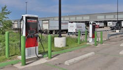 Two Tritium placed 75-kW DC fast chargers are adjacent to the terminal docks. After a daily run, trained employees will drive the vehicles here to charge, and others will retrieve them and return to the dock for loading. Two Tritium placed 75-kW DC fast chargers are adjacent to the terminal docks. After a daily run, trained employees will drive the vehicles here to charge, and others will retrieve them and return to the dock for loading.