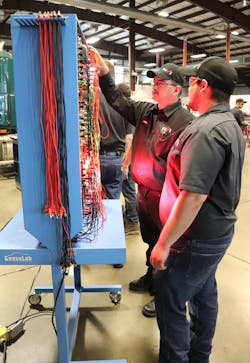 Students in NVI-Blairsville&rsquo;s diesel program learn to detect lighting faults they will see in the fleet by using electrical training boards.