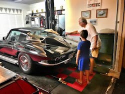 Equipment salesman Lou Cardoza shows his grandson, Aiden, the finer points of lifting his 1966 Corvette at his Hawaii home. Equipment salesman Lou Cardoza shows his grandson, Aiden, the finer points of lifting his 1966 Corvette at his Hawaii home.